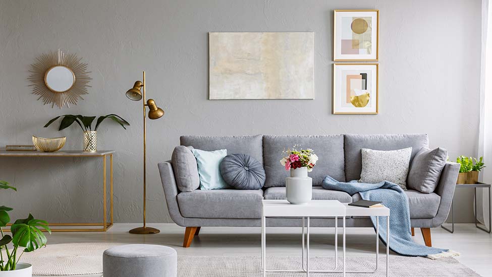 Living Room With Grey Sofa With Wainscoting